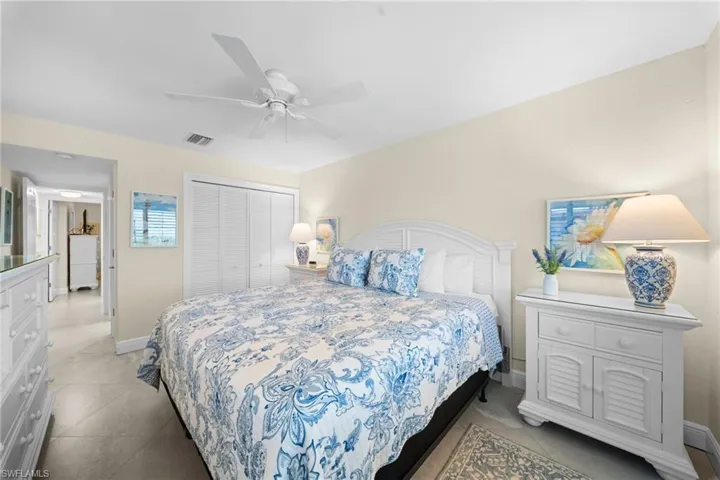 Recessed lighting, ceiling fan, and tile flooring