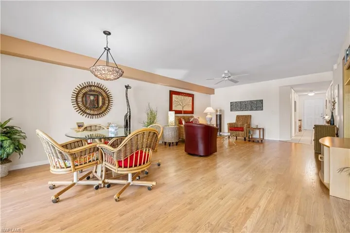 Dining area featuring ceiling fan and light hardwood / wood-style flooring