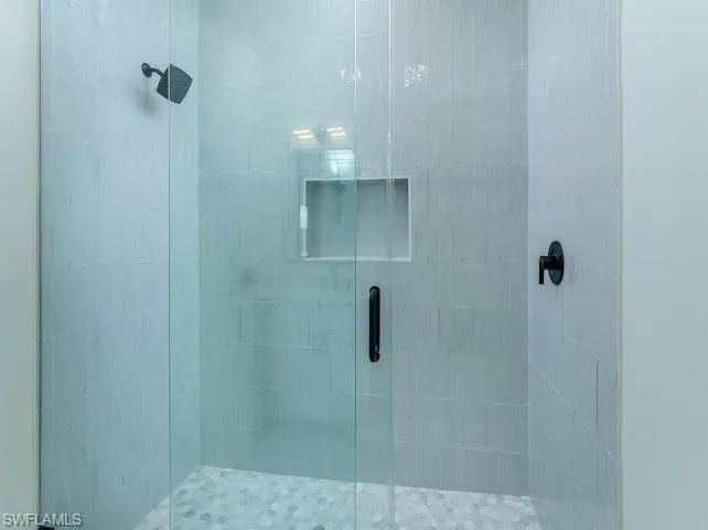 Bathroom with a stall shower