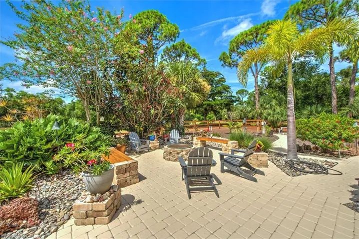 View of patio / terrace with an outdoor fire pit