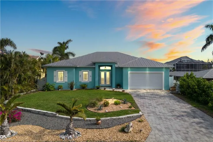 Welcome home! beautiful sunset, with warm light highlighting the architecture, lush landscaping, and a peaceful, welcoming atmosphere.