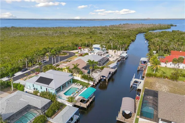 From above, the property offers breathtaking views of the canal with direct, unobstructed access to the Gulf of Mexico.