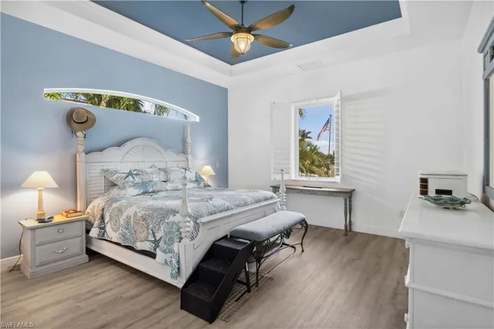 The primary bedroom is a serene and spacious retreat, designed for comfort and relaxation.