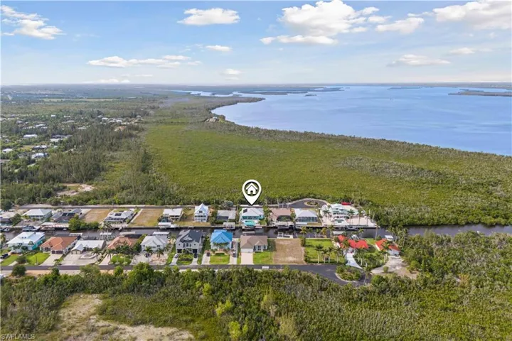From your doorstep, enjoy the convenience of quick access to the open waters, ideal for leisurely boat rides or exploring the natural beauty of the Gulf coast.