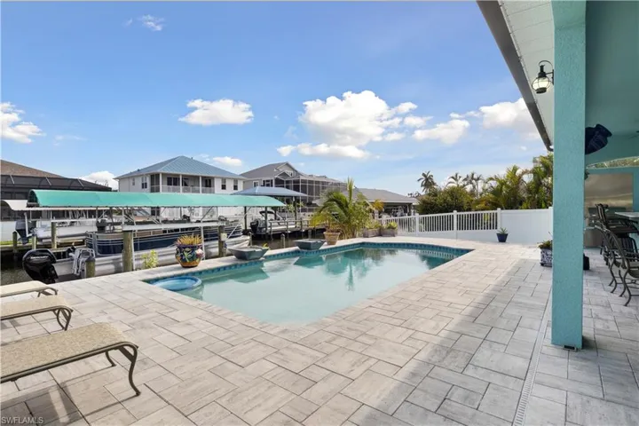 Swim, relax, and entertain in style with a sparkling pool, and outdoor kitchen ready for your next BBQ or sunset dinner.