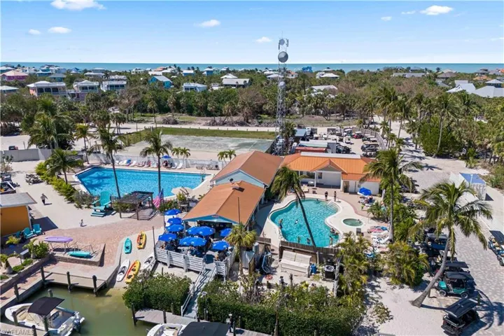 Another photo of Mangos - two pools, spa, easy to pull up via boat dock, just watch out for the manatees who locve to hand out near the docks.  Just a quick walk or golf cart ride from the property.