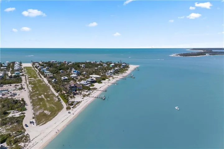 View of the airstip and some of the stunning beach homes on the island tip.