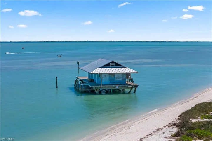 The point house - a historic home and a "lighthouse" for boaters!  A quick right will get you back to the bayside of North Captiva and the restaurants and amenities!