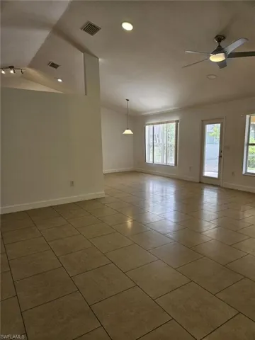 Foyer entrance  leading to the formal living and dining rooms to the left and right and into the expansive great room. You won't see anything else like it in Cape Coral!