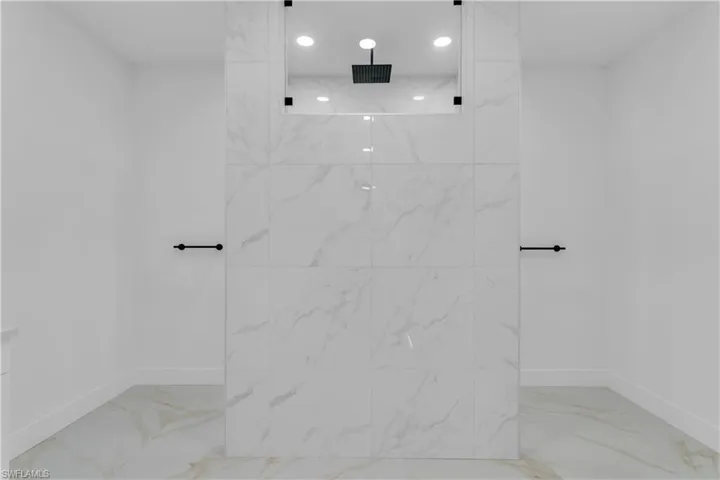 Bathroom featuring tile patterned flooring