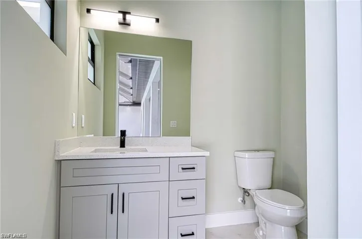 Bathroom accessible from the Lanai/Pool Deck
