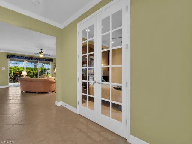Foyer w/ French Door Entry To Bedroom 3 or Den