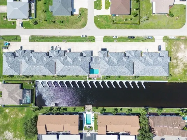 Aerial overview of property's location featuring nearby suburban area