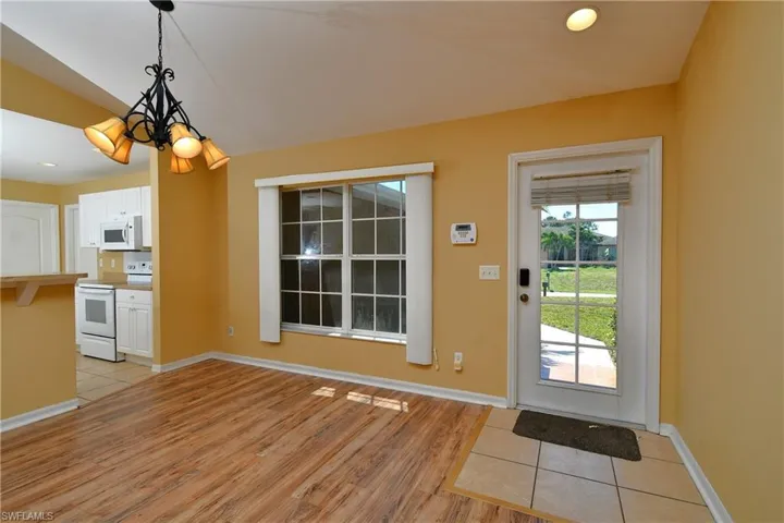 Wood laminate floors in living room and bedrooms.