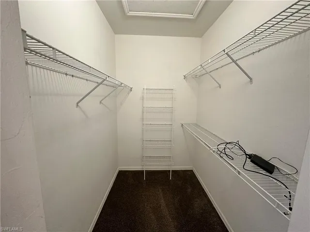 Spacious walk in closet in Primary Bedroom