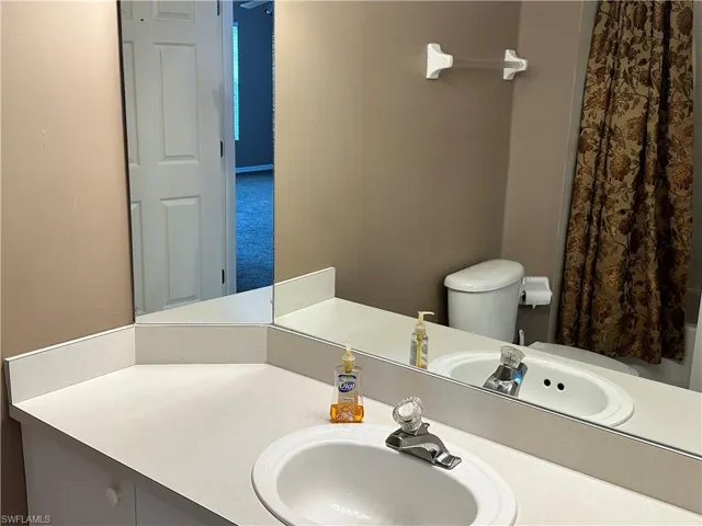 2nd Bathroom with vanity and toilet