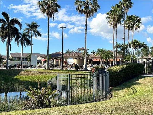 View of community featuring a gazebo, a water view & common area