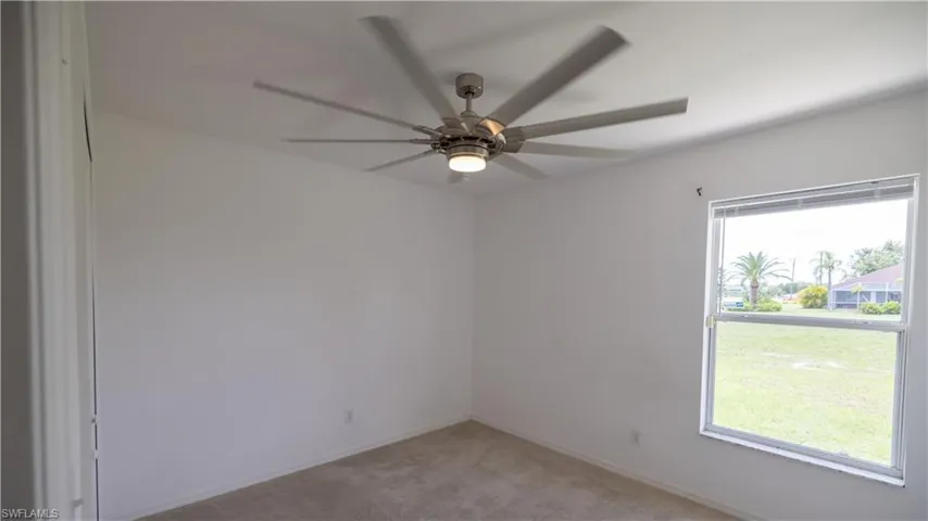Bedroom 1 with a ceiling fan