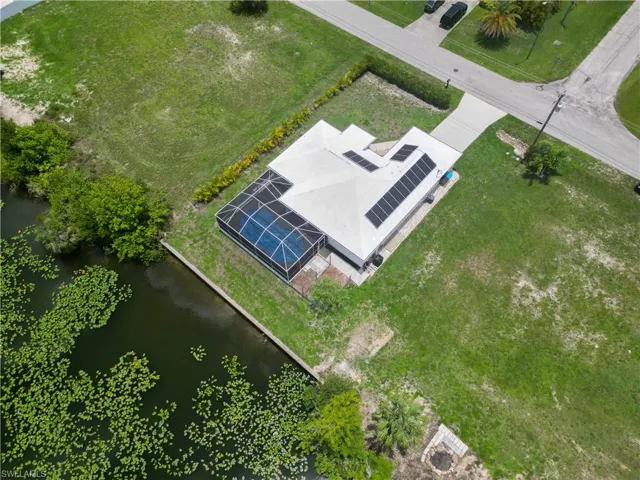 View of subject property with a large body of water