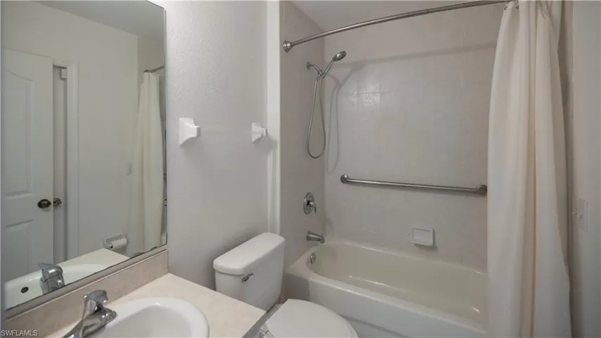 Second Bathroom featuring shower / tub combo w/vanity
