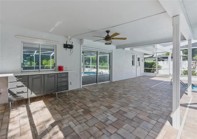 Space under roof with outdoor bar area