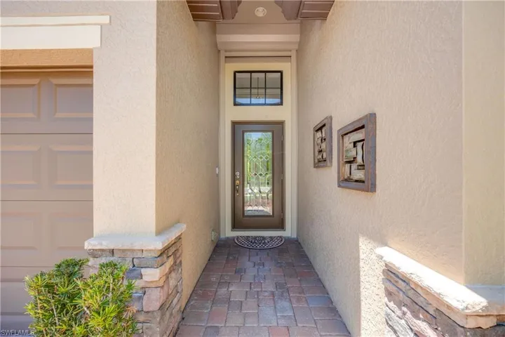Inviting entrance has electric shutter for added protection