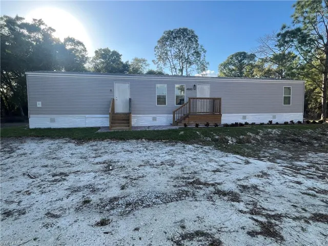 Manufactured / mobile home featuring crawl space and entry steps