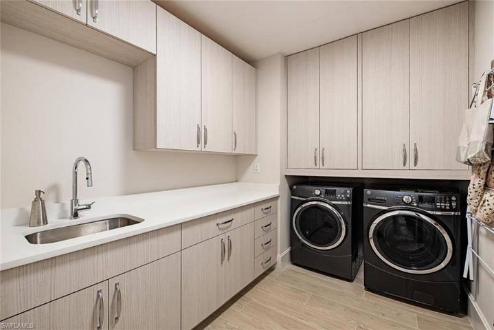 Large laundry room with sink