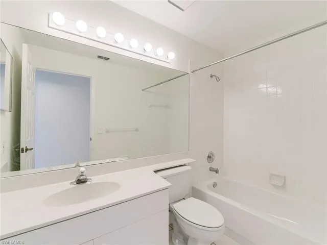 Full bath featuring bathing tub / shower combination and vanity
