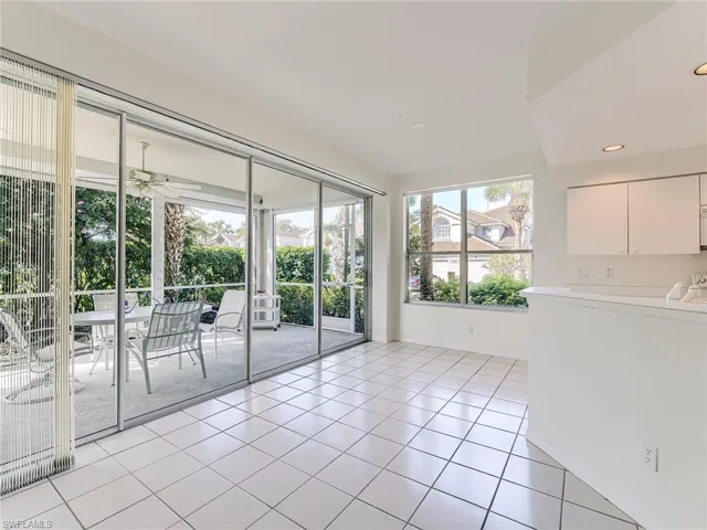 Unfurnished room with a ceiling fan, light tile patterned floors, and recessed lighting