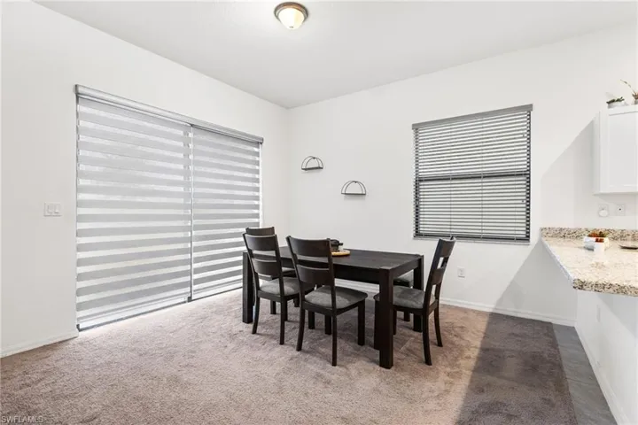 View of carpeted dining space
