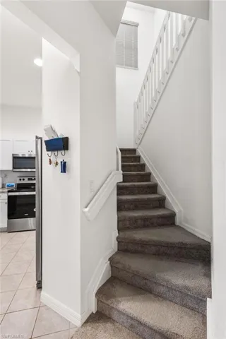 Stairway with tile patterned flooring