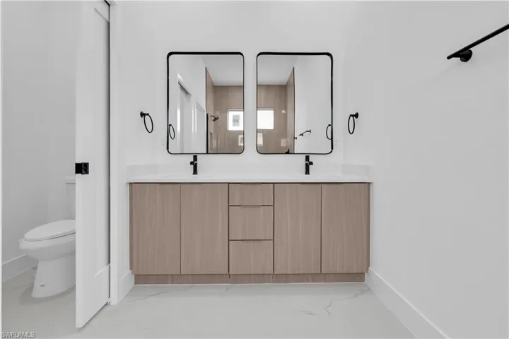 Spare room with recessed lighting and light marble finish flooring