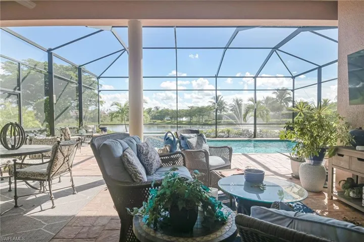 View of patio / terrace with a lanai