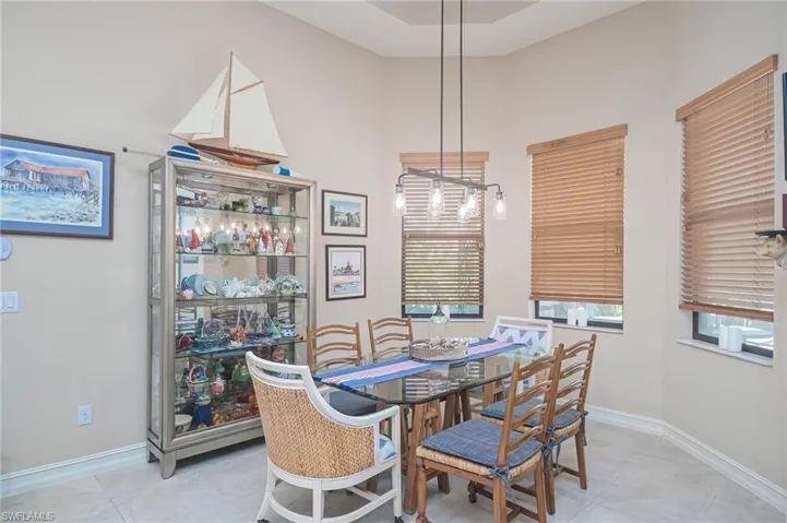 Dining room featuring light tile patterned floors