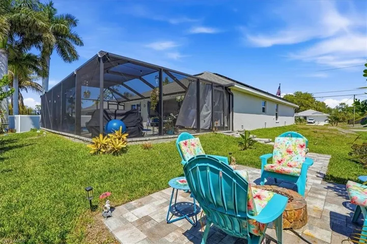 View of patio / terrace with glass enclosure and a sunroom