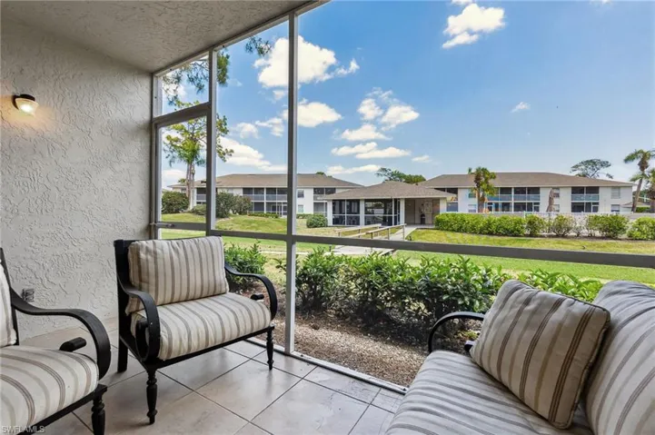 Sunroom with a residential view