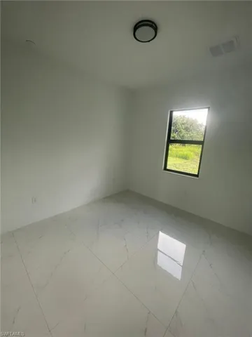 View of tiled empty room
