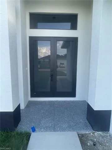 Doorway to property with french doors