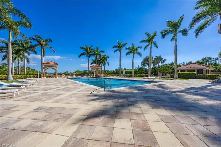 Community pool featuring a gazebo and a patio area