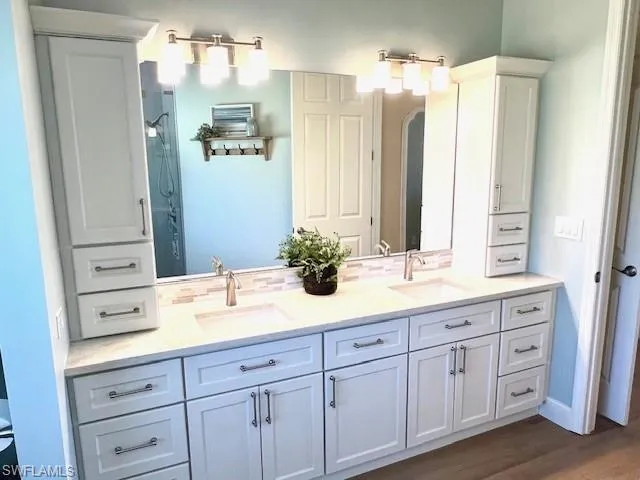 New Vanity with double sinks and quartz countertops.