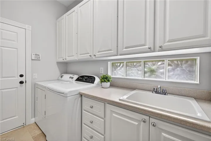Laundry Room with Utility Sink and Cabinets