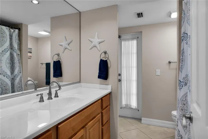 Guest Bathroom Doubles as a Pool Bath