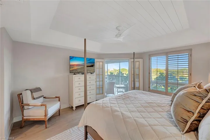 Primary Bedroom opens to Screened Lanai