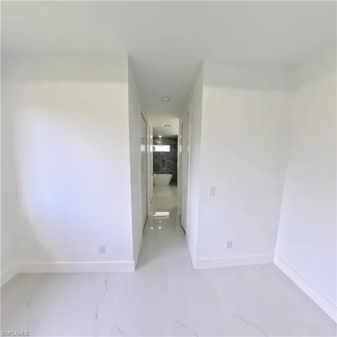 Spare room with baseboards