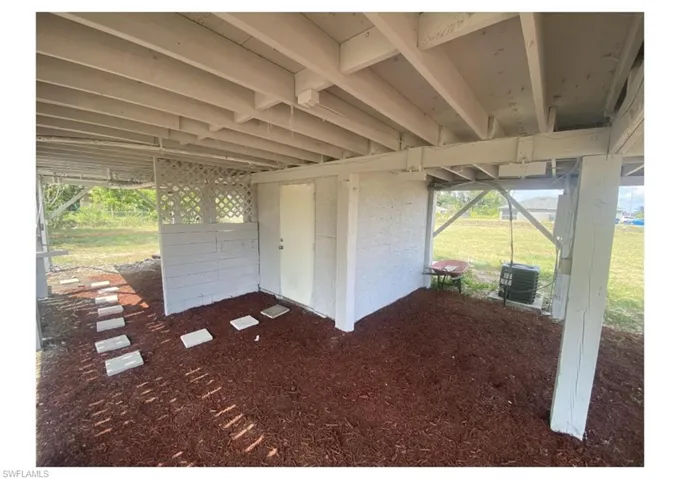 View of patio with central air condition unit