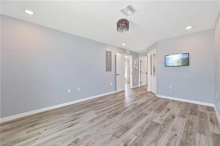 Spare room featuring light hardwood / wood-style flooring
