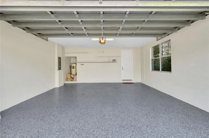 Garage featuring electric panel