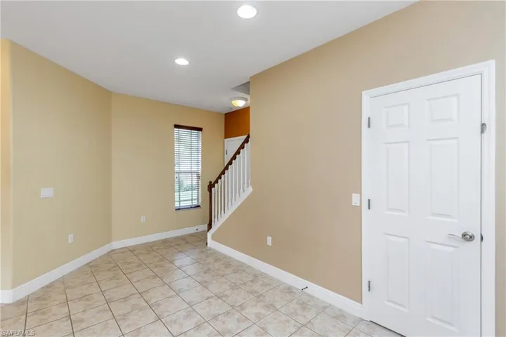 FOYER TO STAIRS TILED