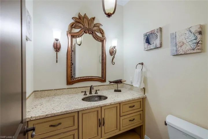 Half bath between kitchen and office